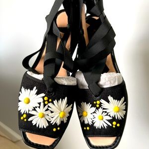 Kate spade sandals. European style with Daisy details.